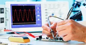 Electronics technician working