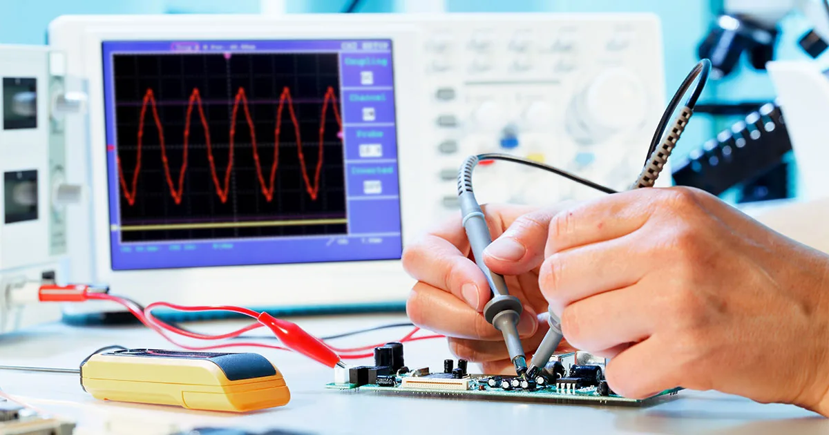 Electronics technician working